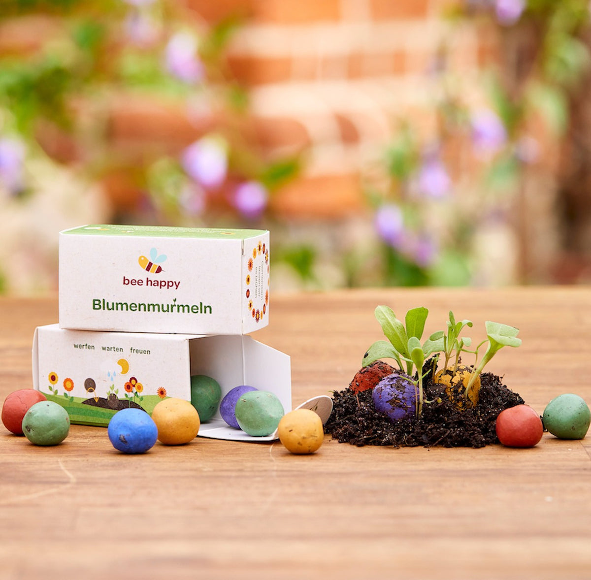 12 Blumenmurmeln in Faltschachtel mit Logo bedrucken – Detail