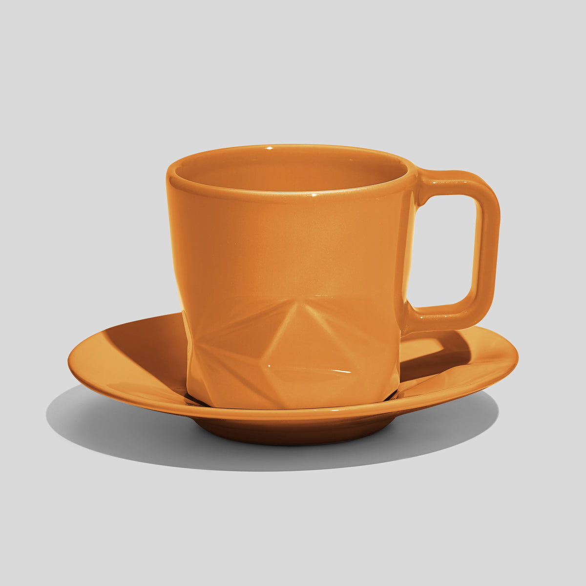 Facettierte Tasse mit Untertasse 200 ml – Senfgelb