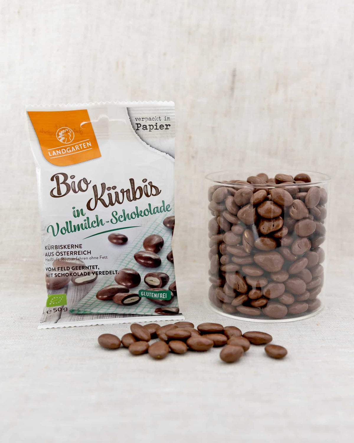 LANDGARTEN Bio Schoko Kürbiskerne 50 g mit Logo Button
