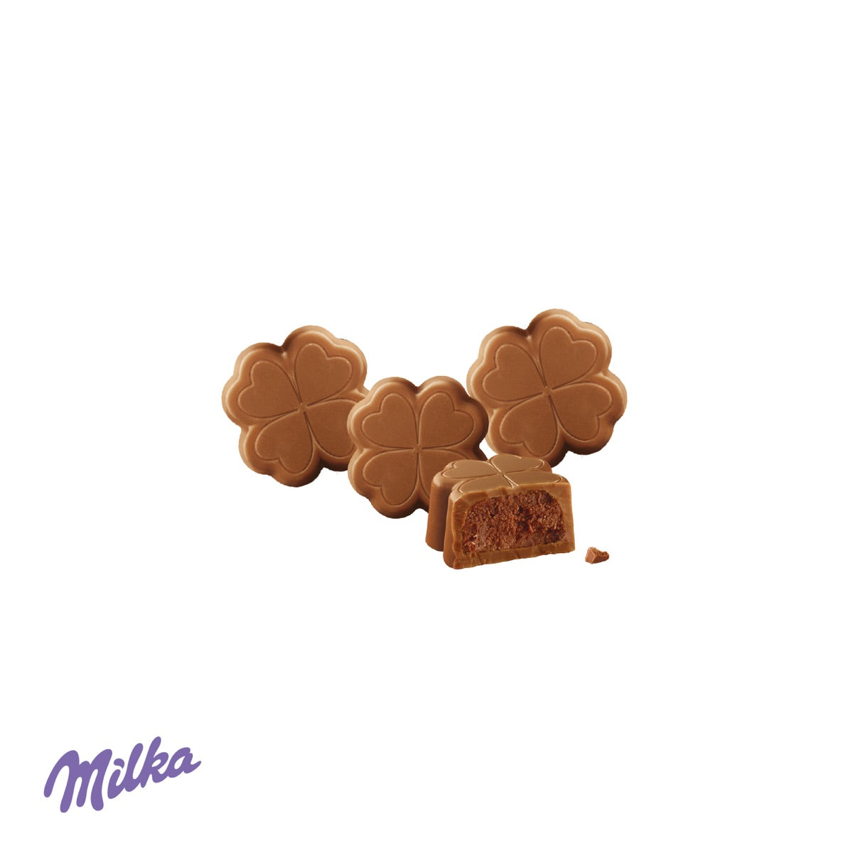Geöffnete Schachtel mit acht Milka Pralinés als Füllung
