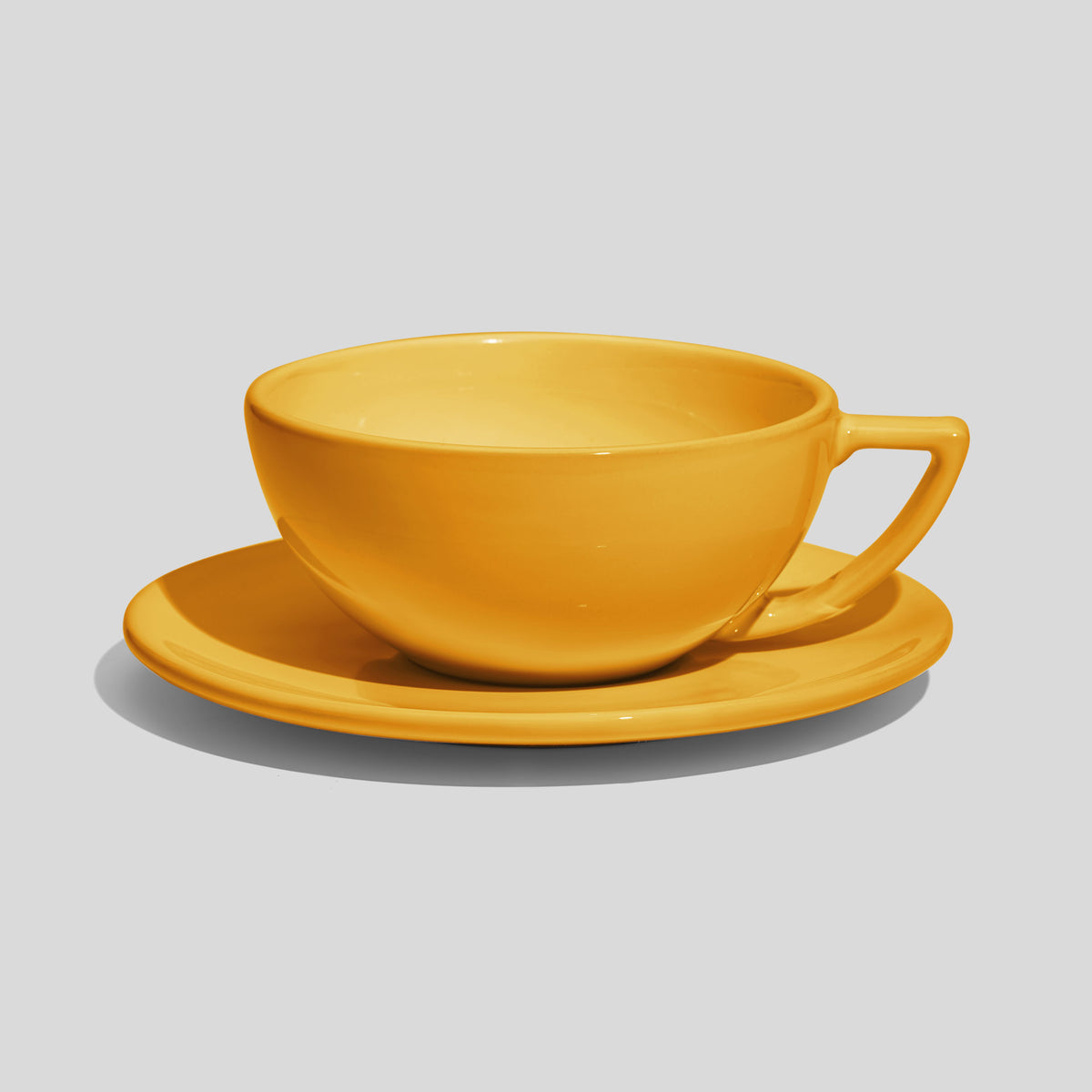 Weite Schalentasse mit Dreiecksgriff und Untertasse 280 ml – Gelb