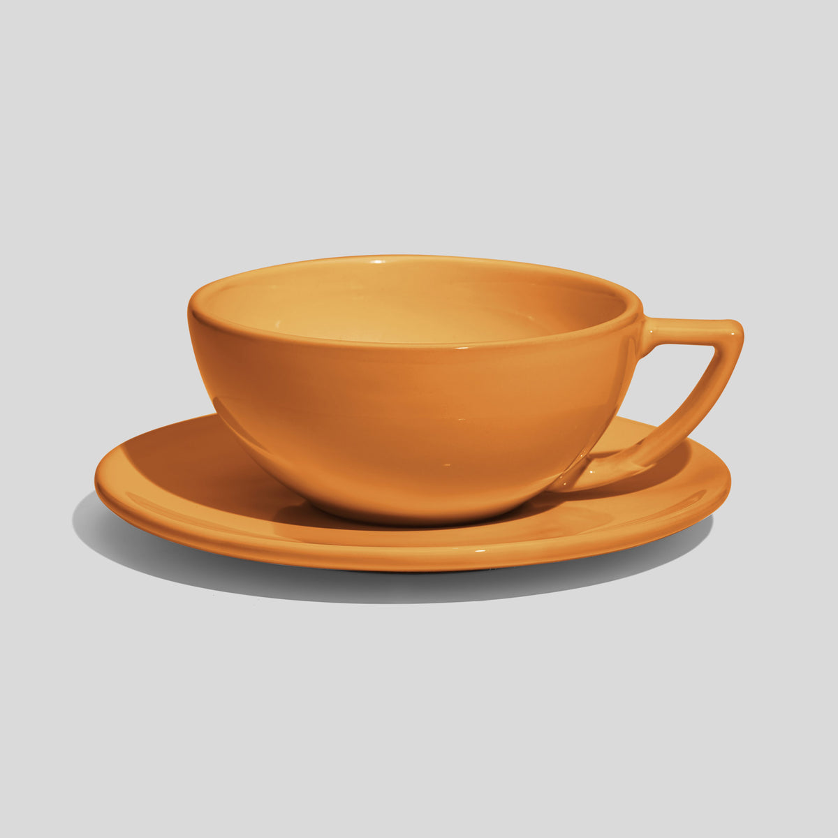 Weite Schalentasse mit Dreiecksgriff und Untertasse 280 ml – Senfgelb