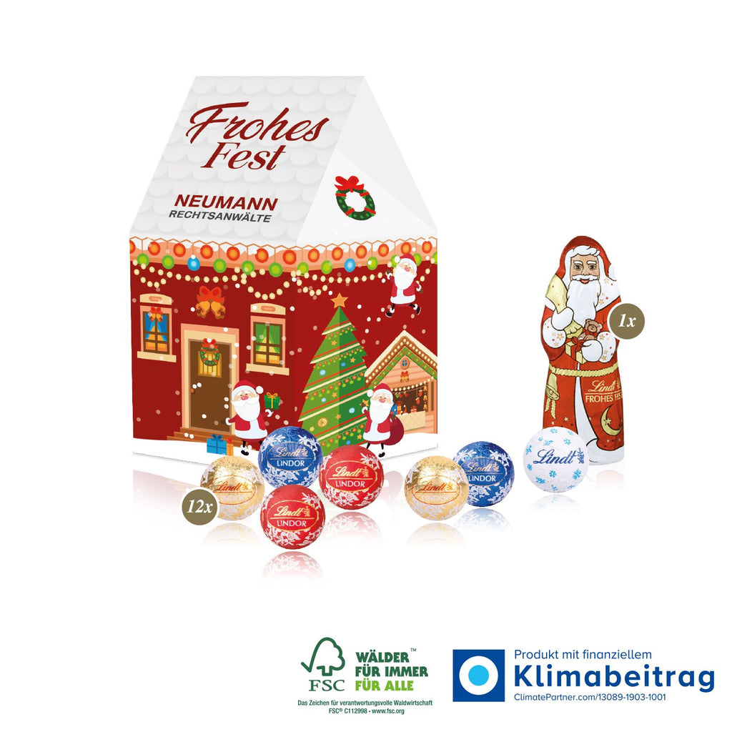 3D Präsent Haus mit Lindt Minis und Lindt Weihnachtsmann, FSC®-zertifiziert und perfekt als festliches Weihnachtsgeschenk für Kundinnen und Mitarbeiterinnen.