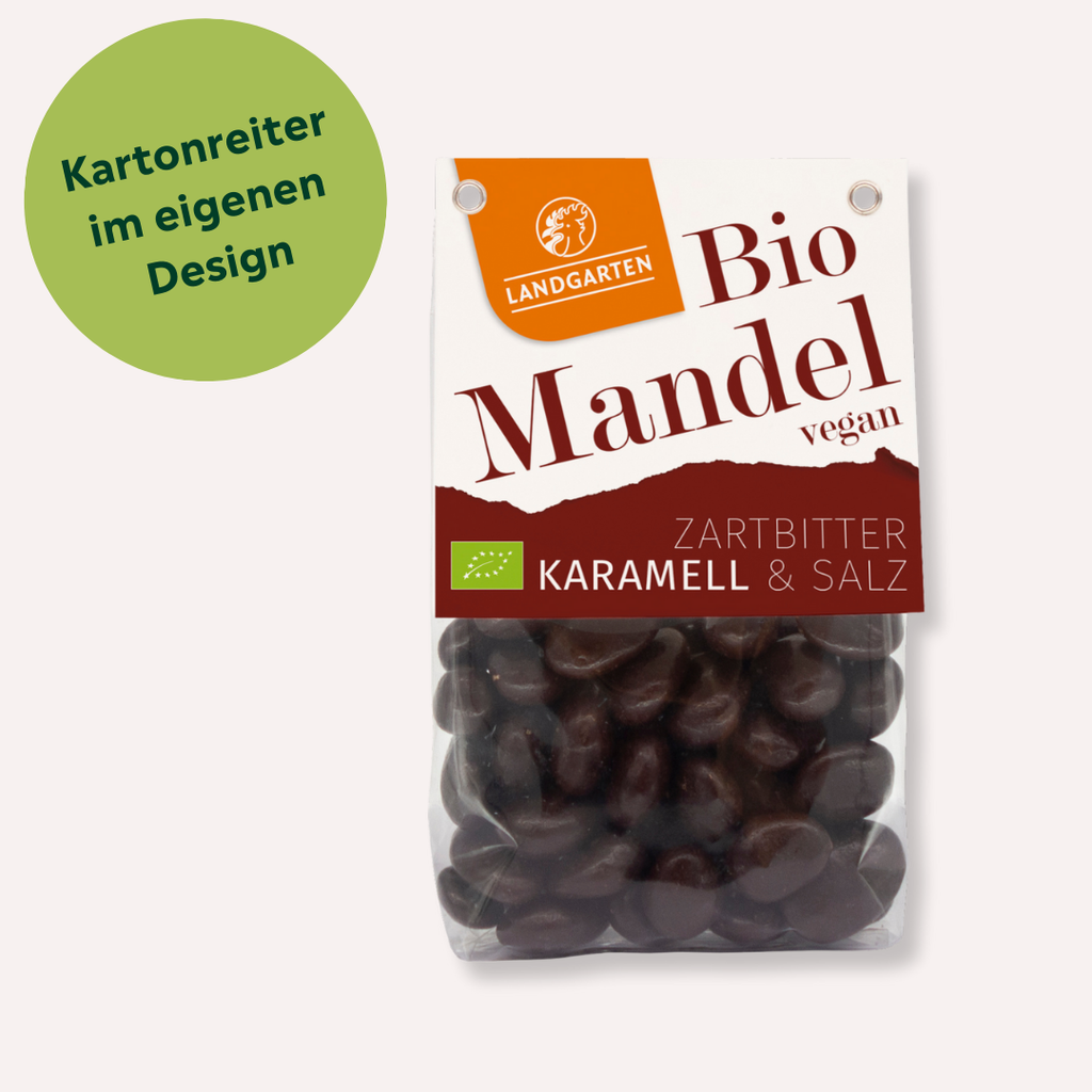 Bio Mandeln in Zartbitterschokolade mit Karamell mit individuellem Kartonreiter bedrucken