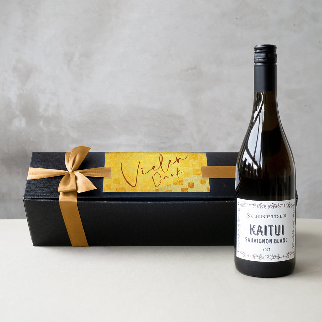 Kaitui Sauvignon Blanc in edler Geschenkbox mit goldener Schleife: Hochwertiger Weißwein in schwarzer Geschenkbox mit Schleife und individueller Karte.