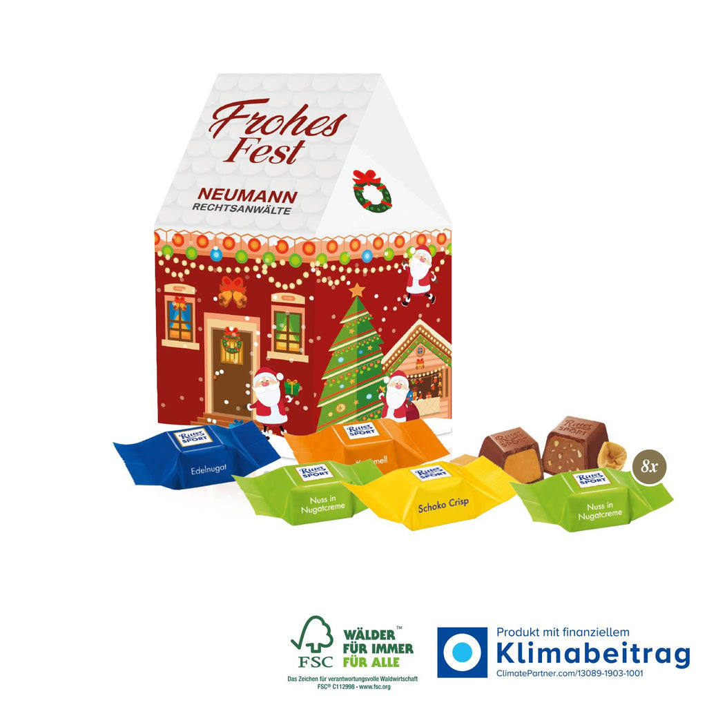 Nachhaltiger 3D Haus Adventskalender gefüllt mit Ritter SPORT Schokowürfeln, FSC®-zertifiziert und ideal für die Immobilienbranche als Weihnachtsgeschenk.