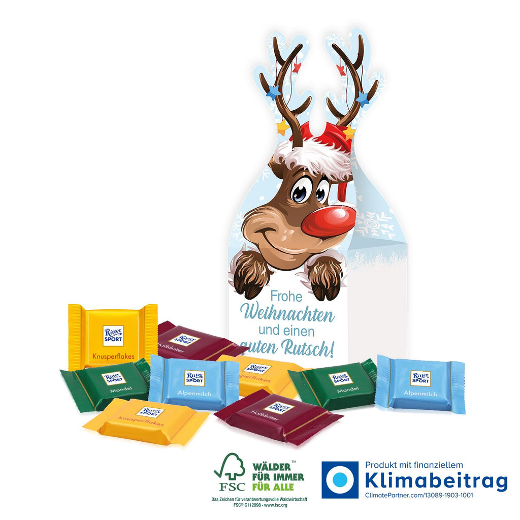 Festlich gestaltetes 3D Rentier-Präsent mit Ritter SPORT Schokotäfelchen, das als Kundengeschenk zu Weihnachten für süße Genussmomente und Aufmerksamkeit sorgt.