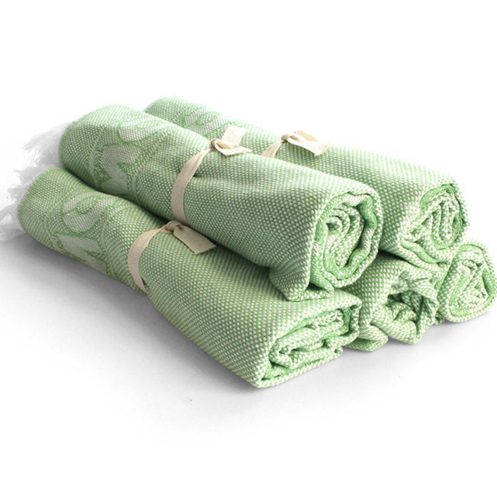 Handtücher aufeinander in grün