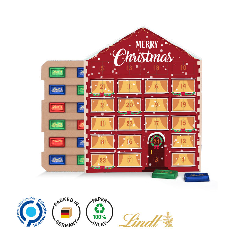 Täfelchen Adventskalender Haus aus Papier mit Lindt Schokolade.