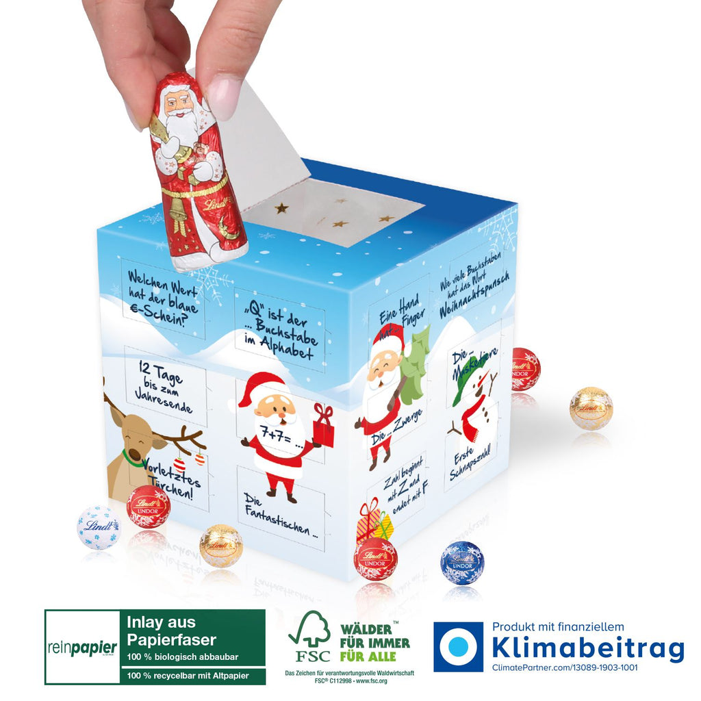 Inhalt des Adventskalenders Lindt „Cube“ Organic mit einem Lindt Weihnachtsmann und 23 zartschmelzenden Lindt „Minis“ in nachhaltiger Verpackung.