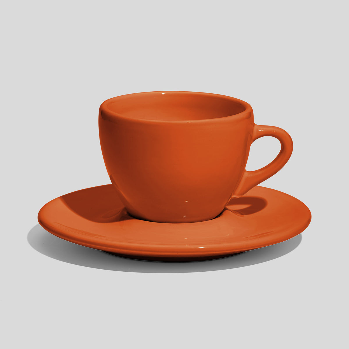 Breite Tasse mit Untertasse 160 ml und Bogenhenkel – Orange