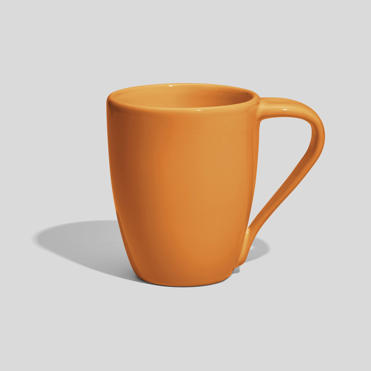 Eiförmige Keramiktasse 250 ml mit langem Schräghenkel – Senfgelb
