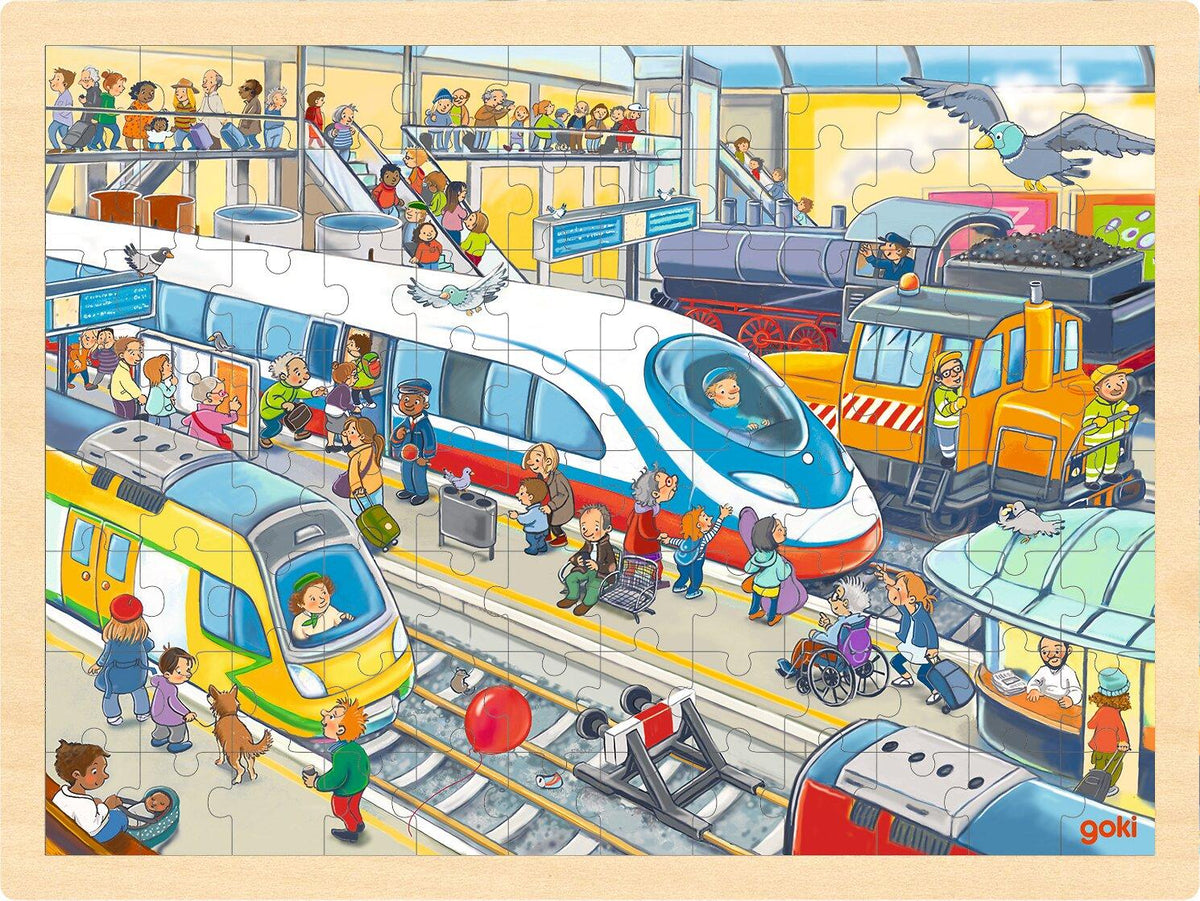 Einlegepuzzle Bahnhof mit Zügen und Reisenden von goki
