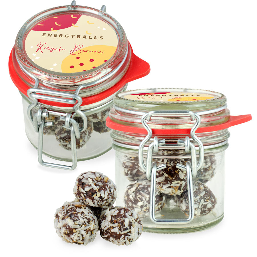 Energyballs Kirsche Banane im Mini Bügelglas 60 g mit Logo – Beispielmotiv