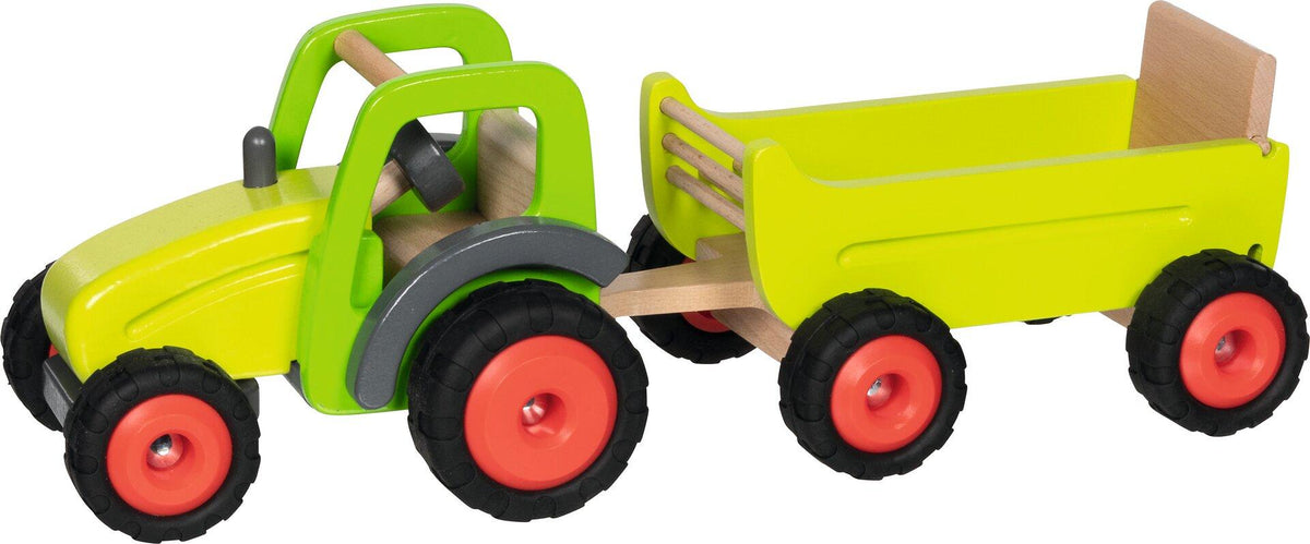 Holztraktor in Grün mit Heuwagen und roten Rädern