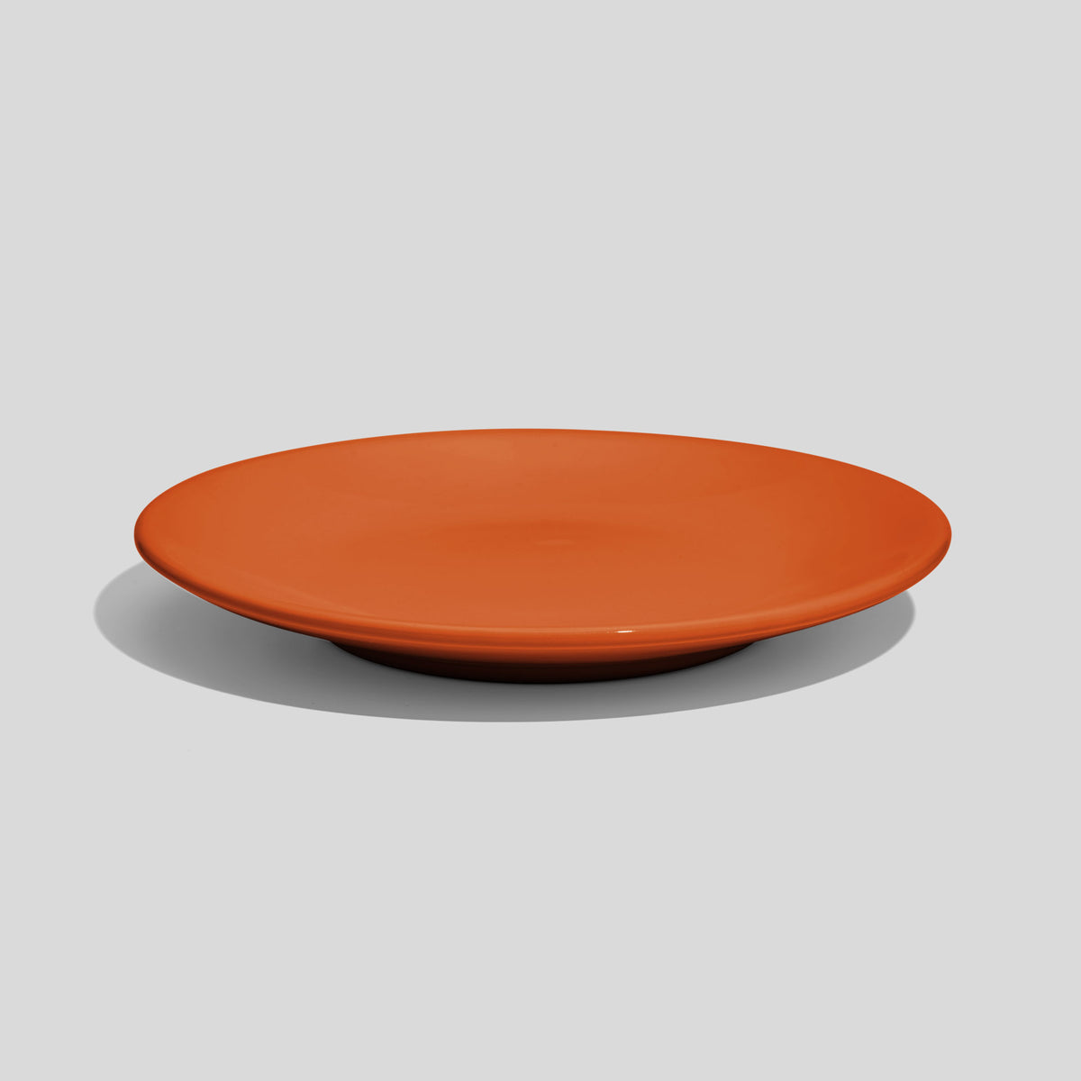 Kleiner Keramikteller 15 cm mit Standring – Orange