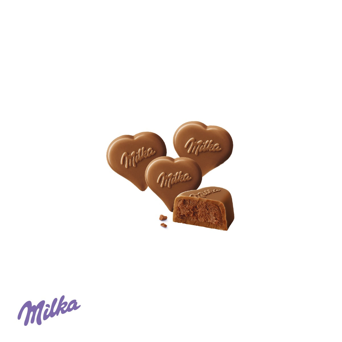 Schuber geöffnet mit herzförmigen Milka Pralinés
