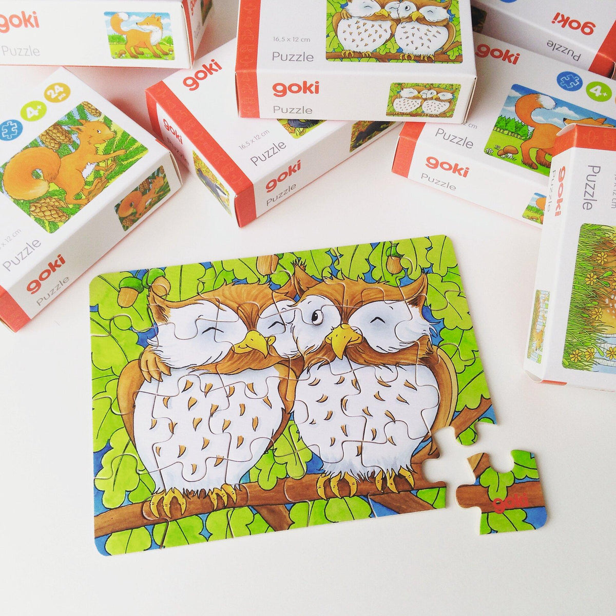 Minipuzzle mit 24 Teilen und eigenem Motiv – Beispiel mit Motiv und Faltschachtel von goki