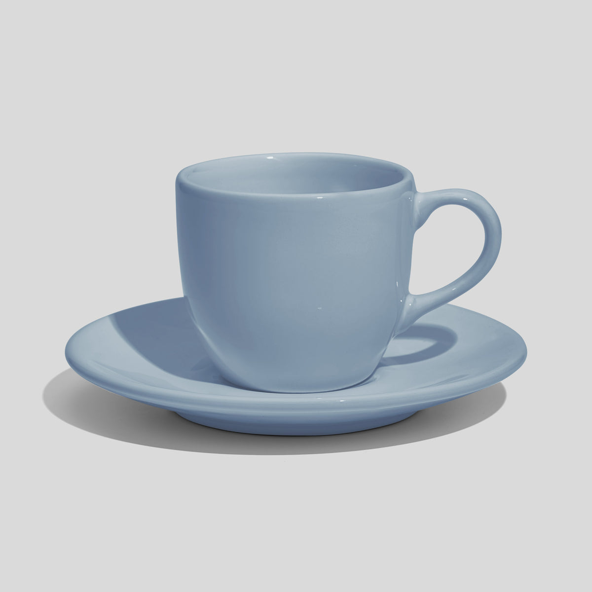 Rundliche Tasse mit Untertasse 180 ml und Bogenhenkel – Hellblau