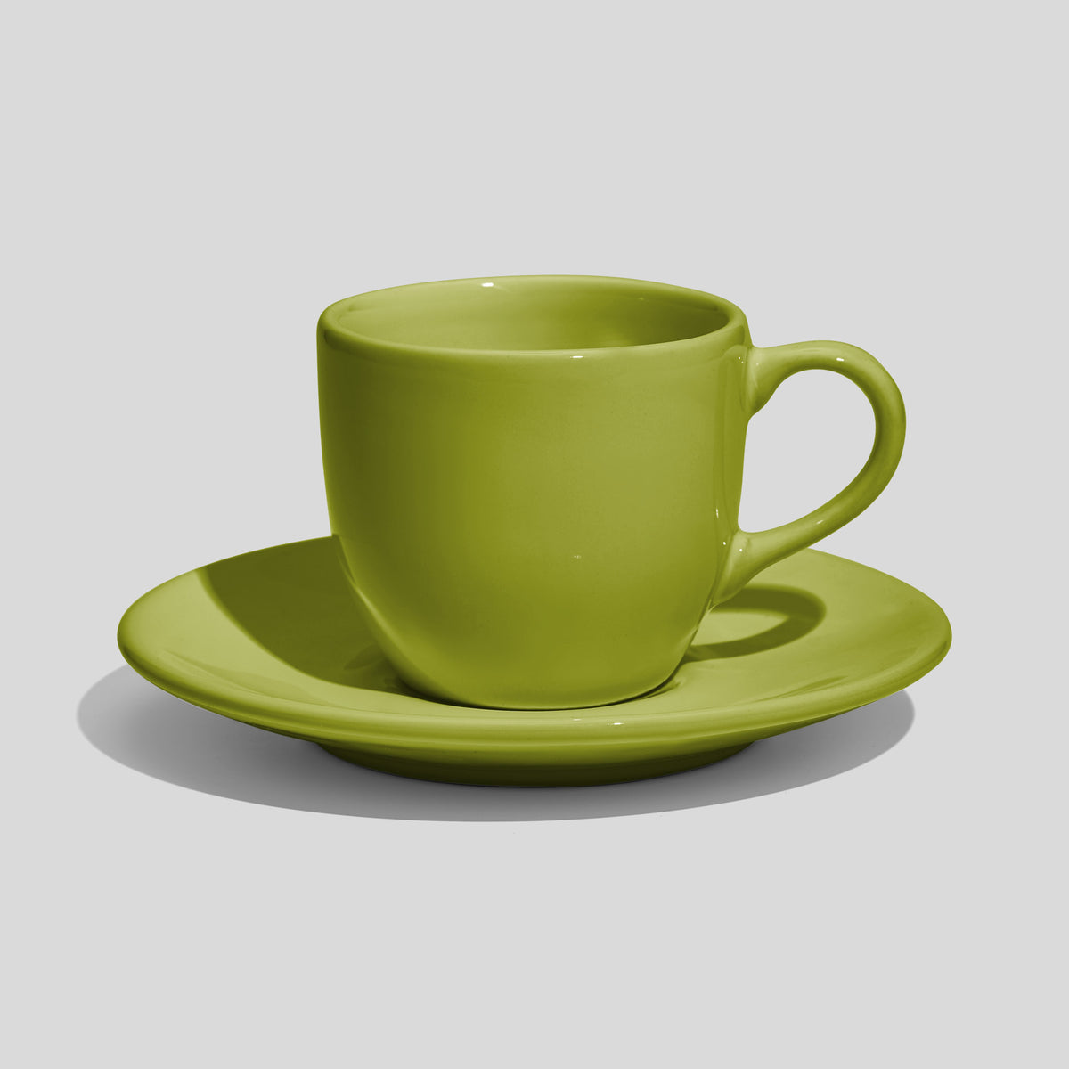 Rundliche Tasse mit Untertasse 180 ml und Bogenhenkel – Limettengrün