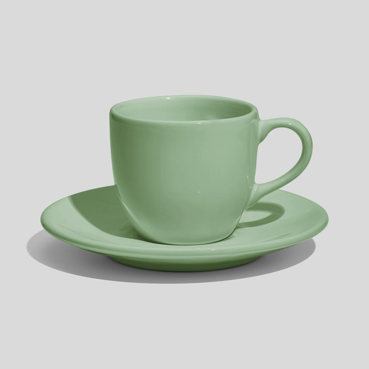 Rundliche Tasse mit Untertasse 180 ml und Bogenhenkel – Mintgrün