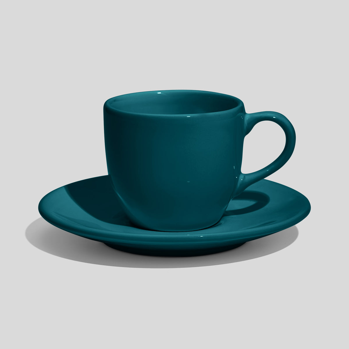 Rundliche Tasse mit Untertasse 180 ml und Bogenhenkel – Petrol