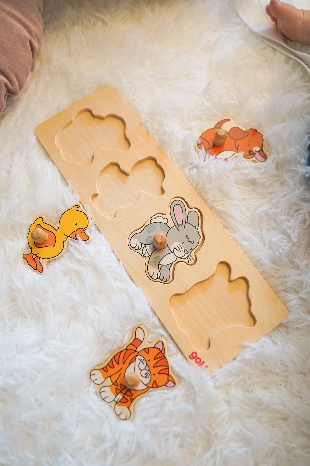 Schmales Steckpuzzle mit Hund, Ente, Hase und Katze – weitere Ansicht