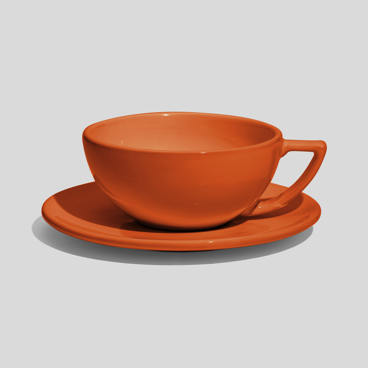 Weite Schalentasse mit Dreiecksgriff und Untertasse 280 ml – Orange