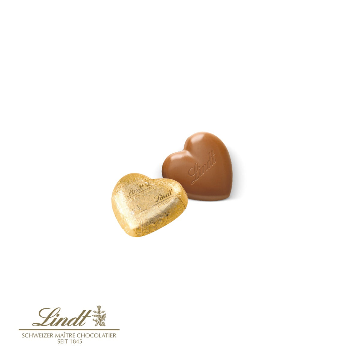Offene Karte mit einem kleinen Schokoladenherz von Lindt